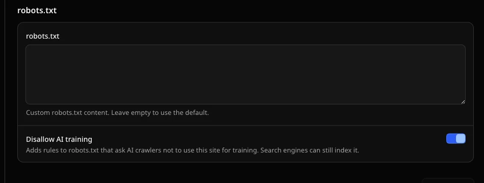 The robots.txt section in the SEO settings of EmDash 1.3. An empty field for a custom robots.txt, below it the switch Disallow AI training turned on, with the note that search engines can still index the site.